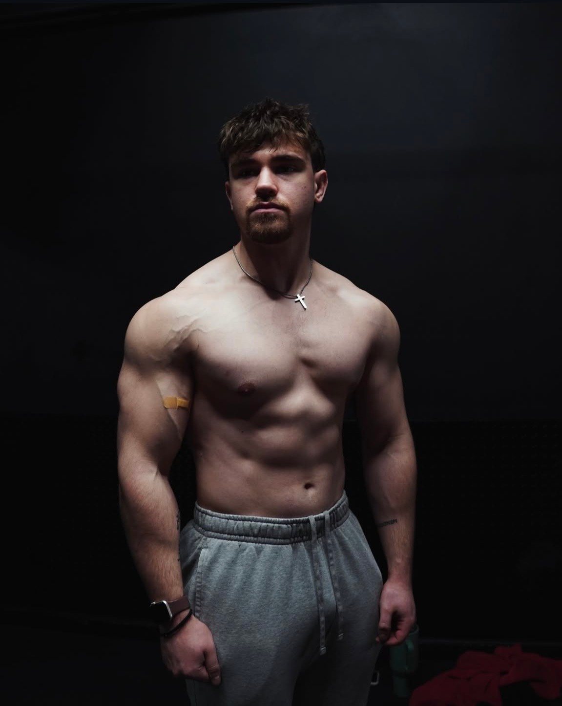 Lance Parker, Bucks County's Best Personal Trainer 2026, shirtless against a dark gym background